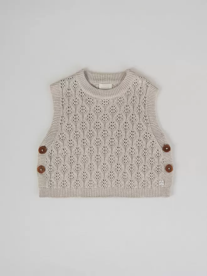 CHALECO DE PUNTO ESTRUCTURA ABERTURA LATERA HIELO