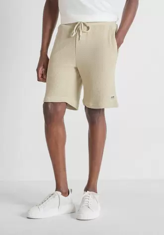 PANTALONES CORTOS REGULAR FIT DE MEZCLA DE ALGODÓN CON LOGOTIPO DE GOMA