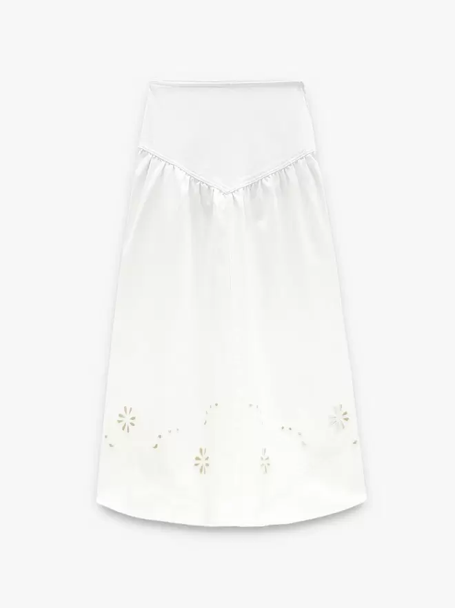 Falda denim con bordados perforados 100% algodón