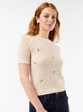 Jersey de manga corta con flores bordadas