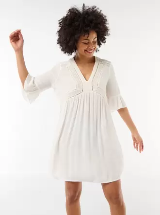 Vestido de playa de punto crepé y macramé