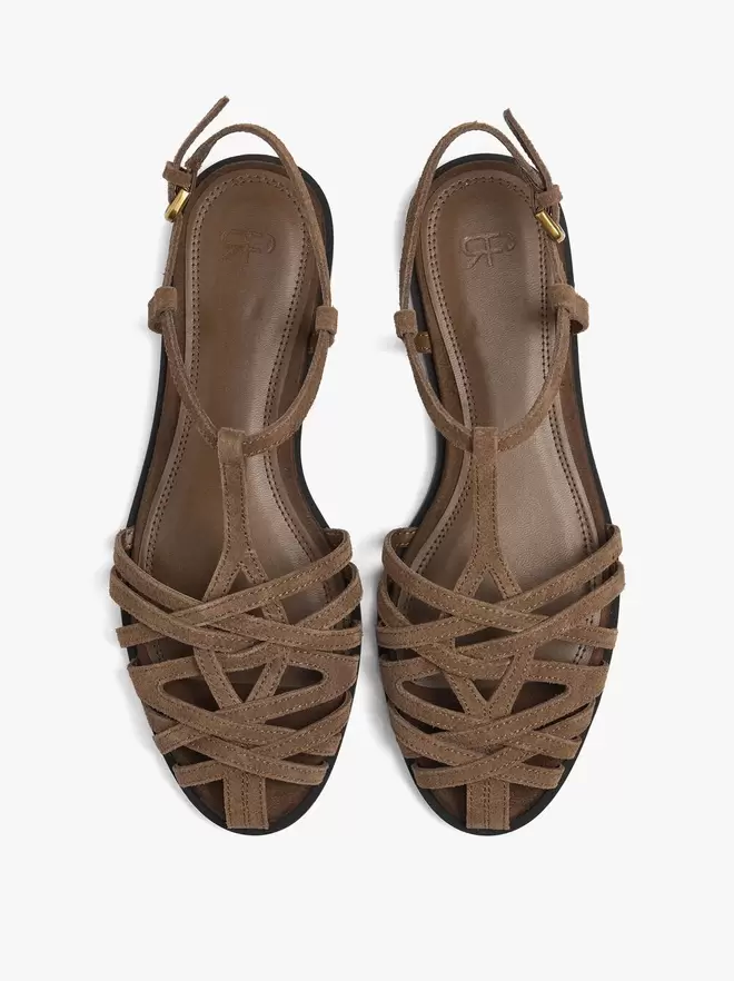 Sandalias planas de piel con tiras entrelazadas