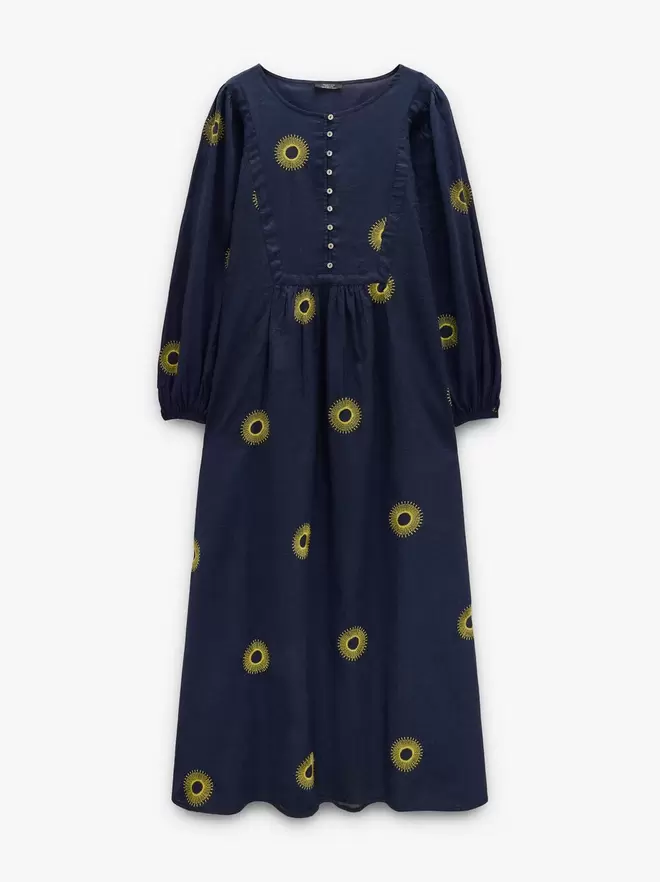 Vestido midi con bordados 100% algodón
