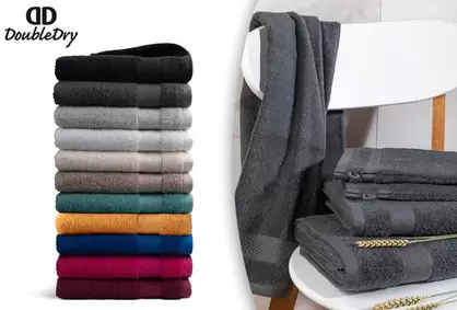 Toallas, alfombrillas y guantes de baño de hotel de calidad