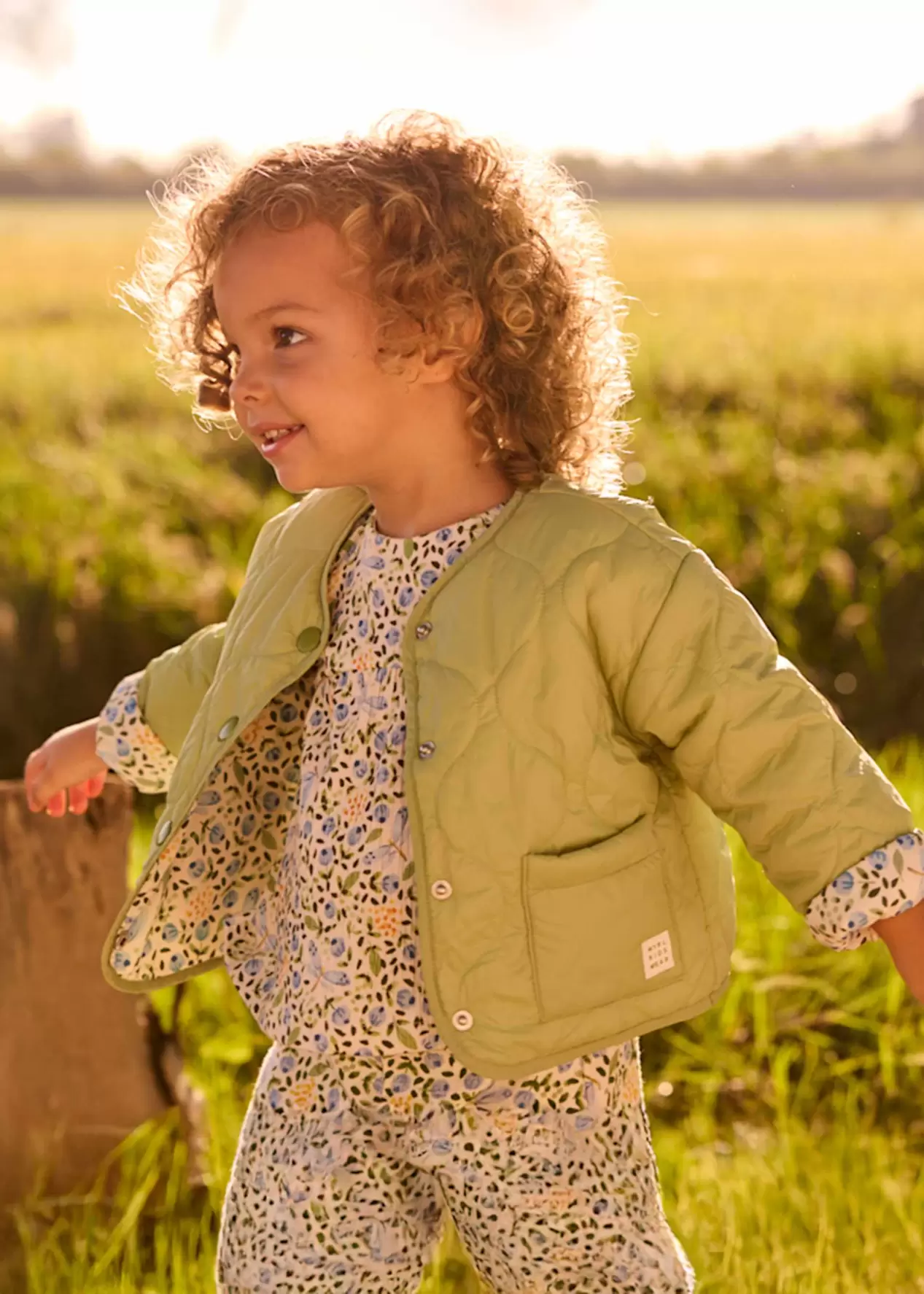 Cortavientos acolchado estampado reversible bebé