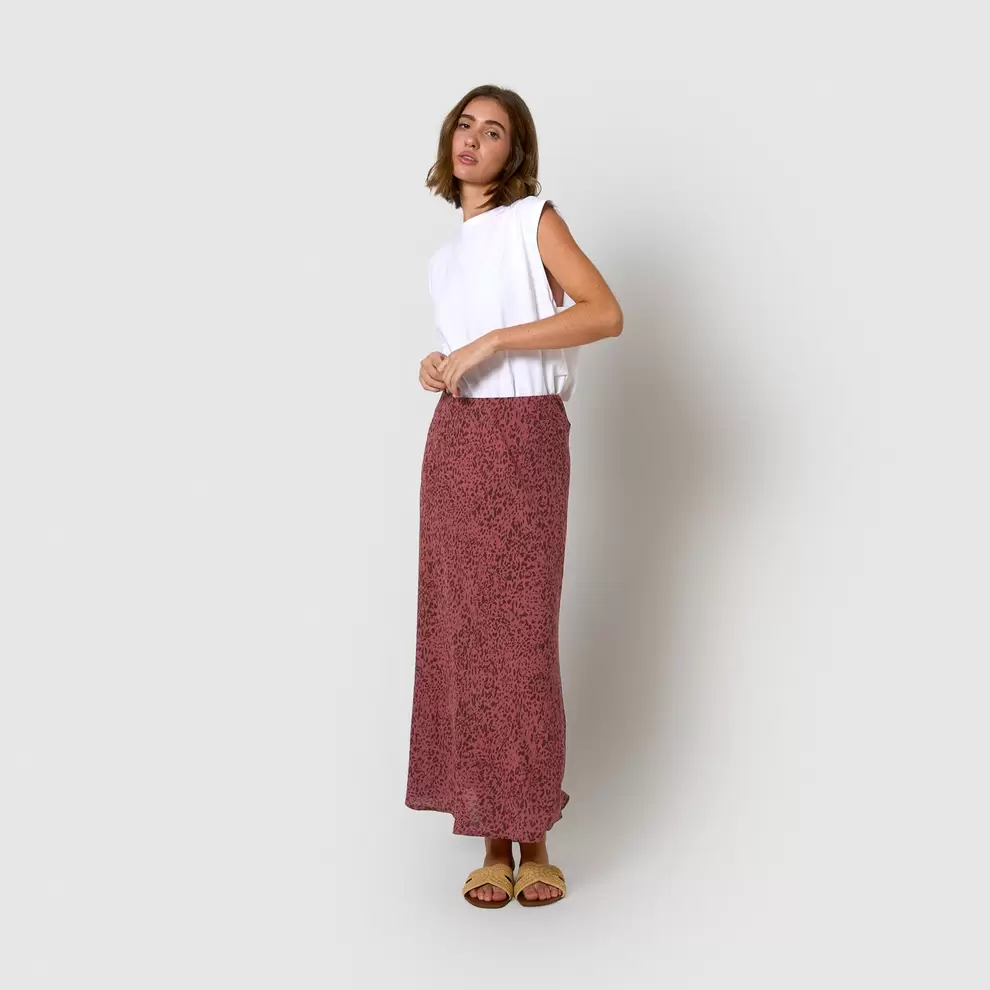Falda midi bambula detalles plisados berry rosa