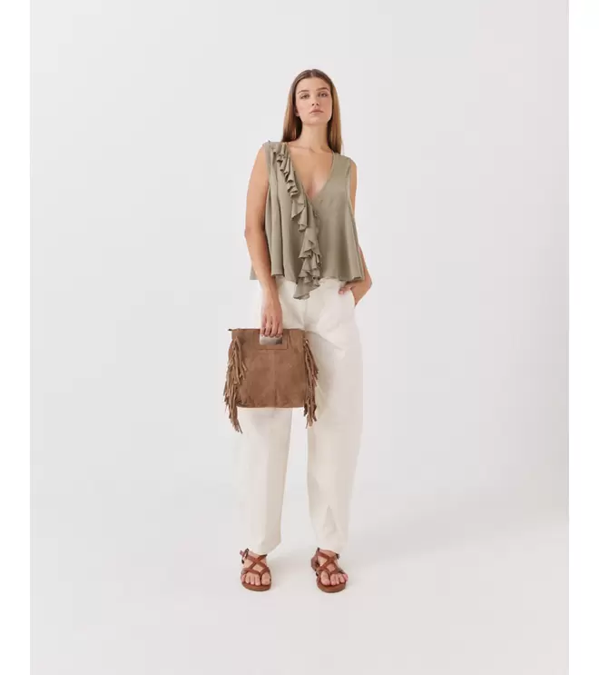 BLUSA VOLANTE ASIMÉTRICO