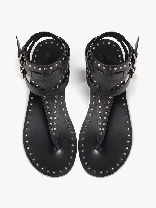 Sandalias planas de piel con tachuelas