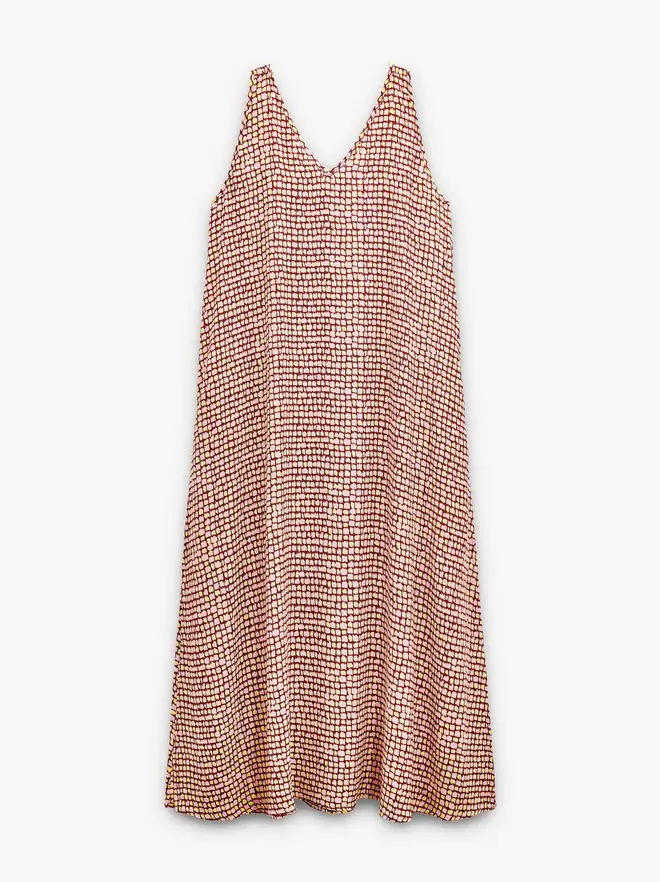 Vestido fluido estampado con bolsos