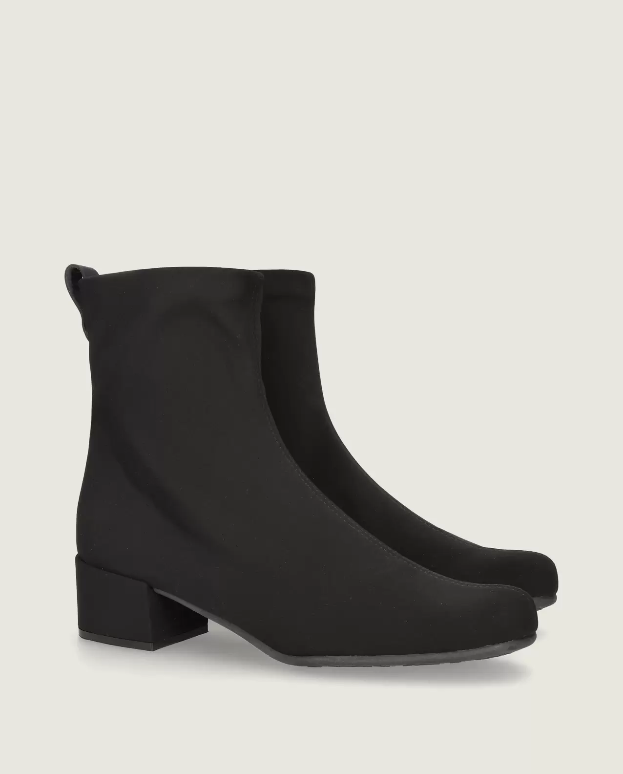 Milan ankle boot in black elasticated textile