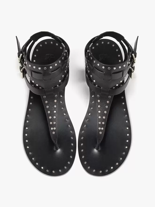 Sandalias planas de piel con tachuelas