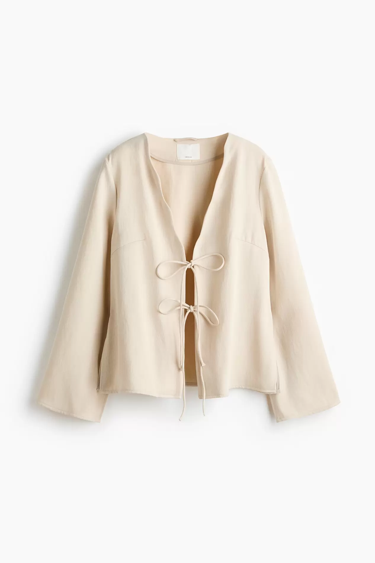 Chaqueta en mezcla de lino con lazadas