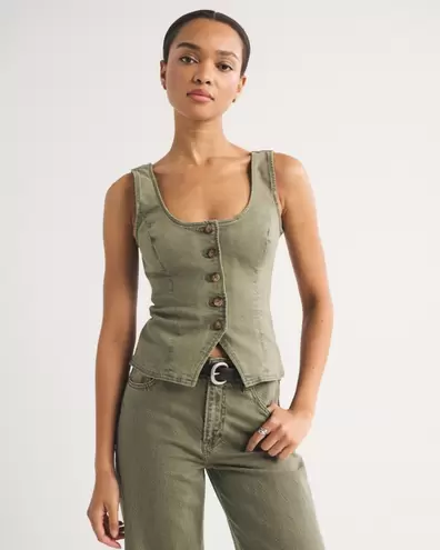 Chaleco denim con cuello redondo y lazada en la parte posterior