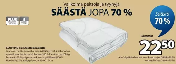 Valikoima peittoja ja tyynyjä