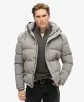Lyhyt hupullinen Everest-toppatakki