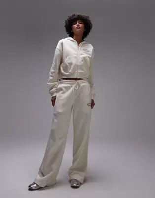 New Balance fleece wide leg jogger in beige