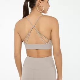 Sports bra with crossed straps