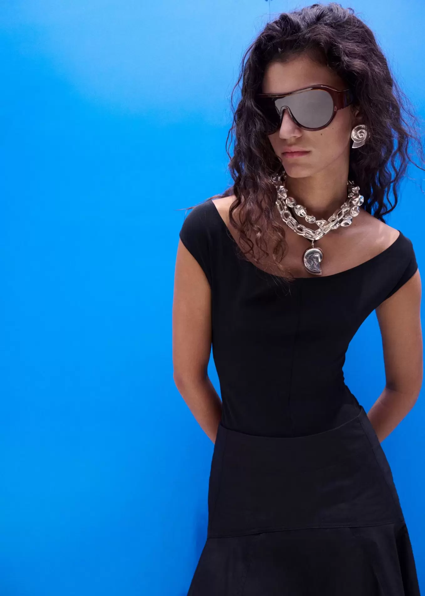 Fitted bodysuit with open back