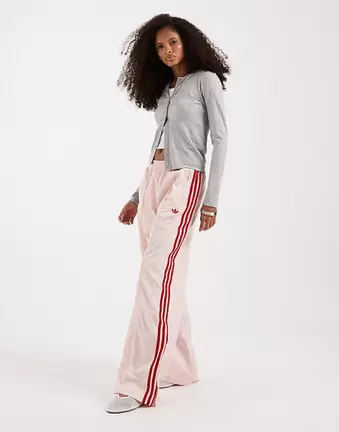 Adidas Originals Firebird loose nylon track pants in pink and red