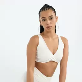 Sports bra with twisted front