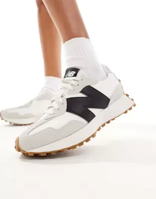 New Balance 327 trainers with gum sole in white and black