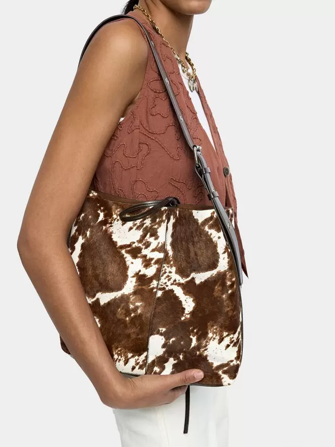 Shoulder bag with leather