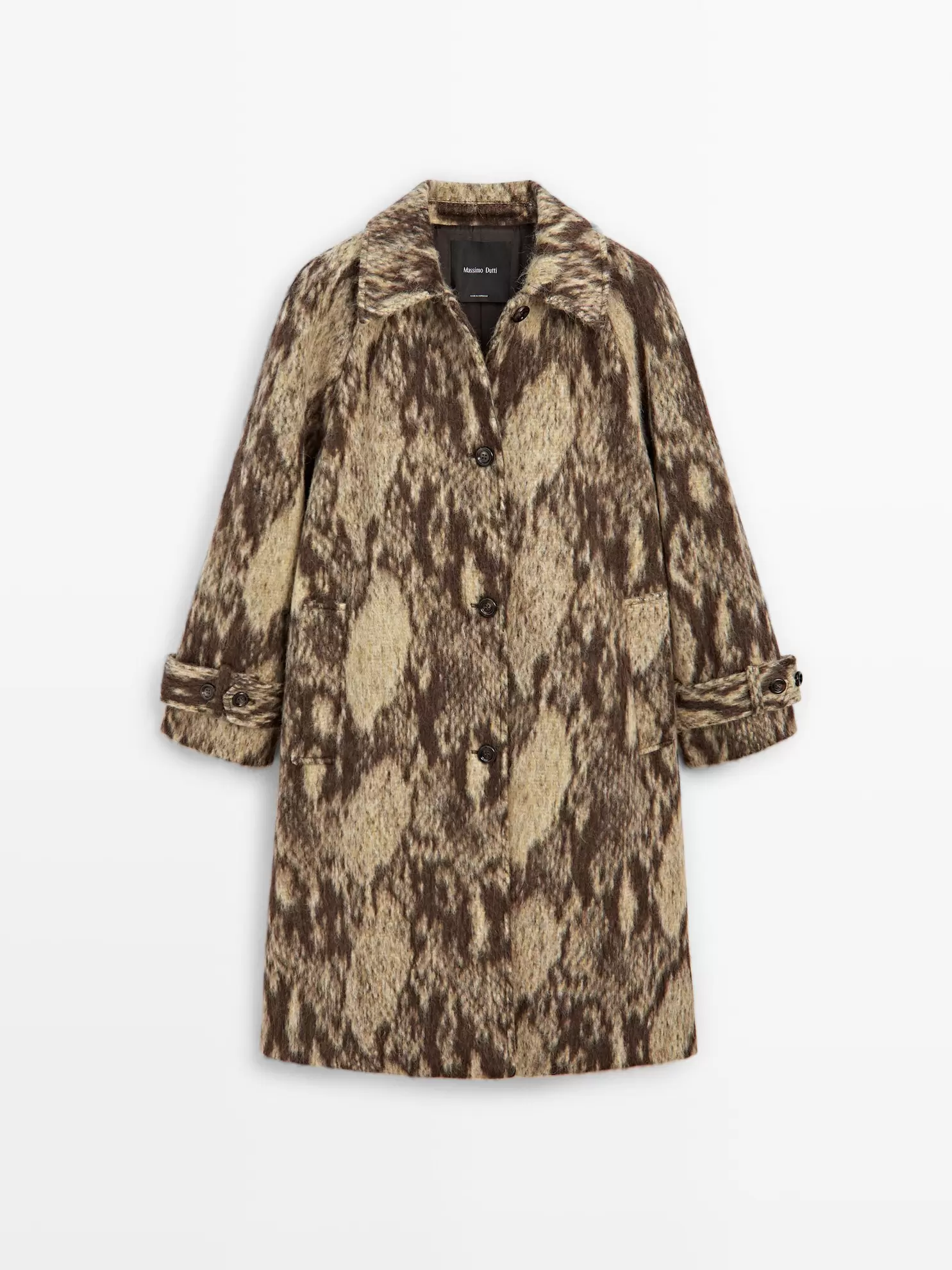 Long wool blend snakeskin print coat  100% cotton trousers with elasticated hems  Wedge heeled mules