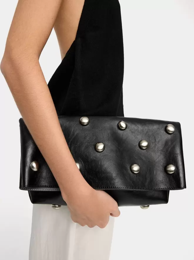 Handbag with spheres and flap