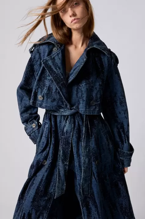 Degraded denim trench coat