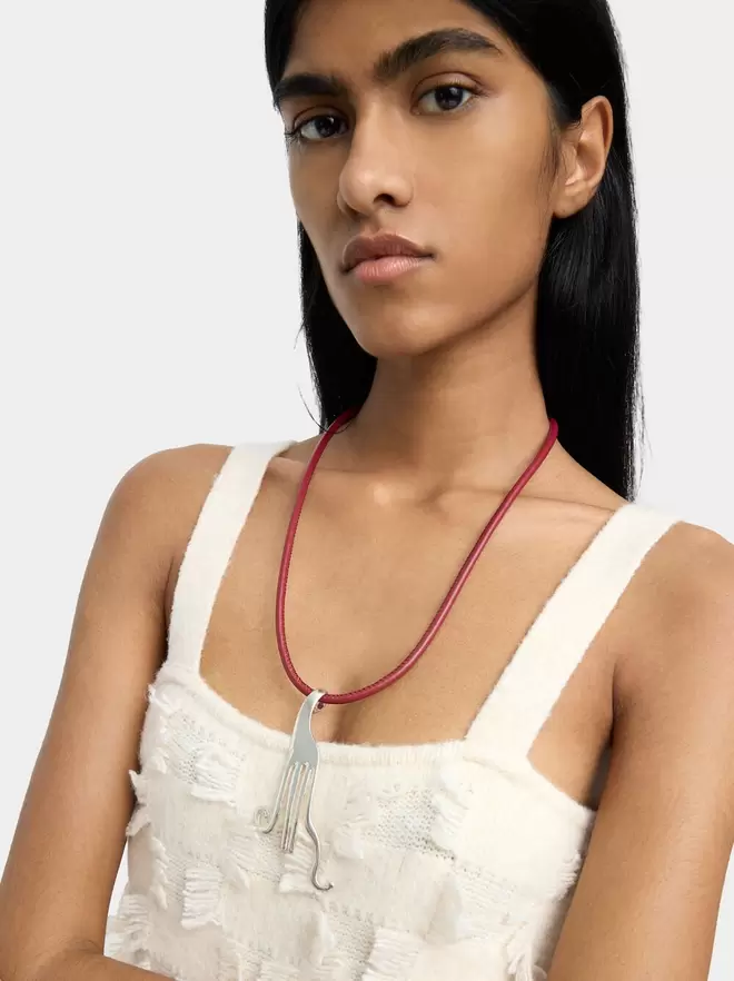 Necklace with cord with fork pendant