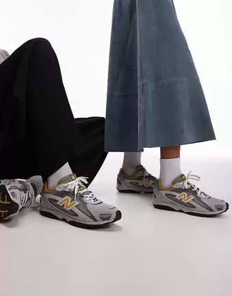 New Balance 204L unisex trainers in grey and yellow suede