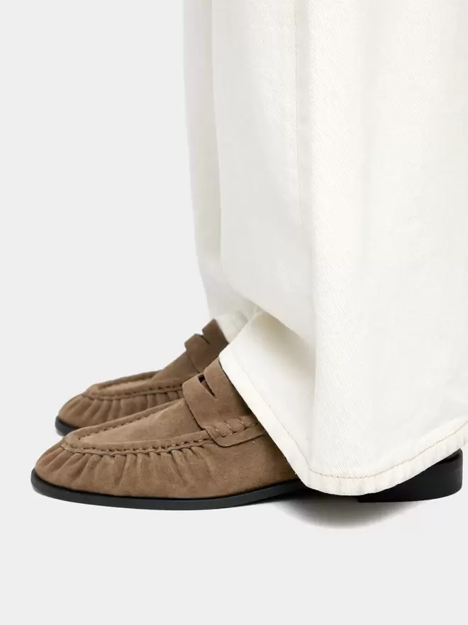 Leather moccasins with stitching
