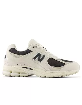 New Balance 2002 trainers in beige and black