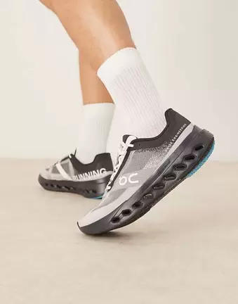 ON Cloudsurfer Next running trainers in black