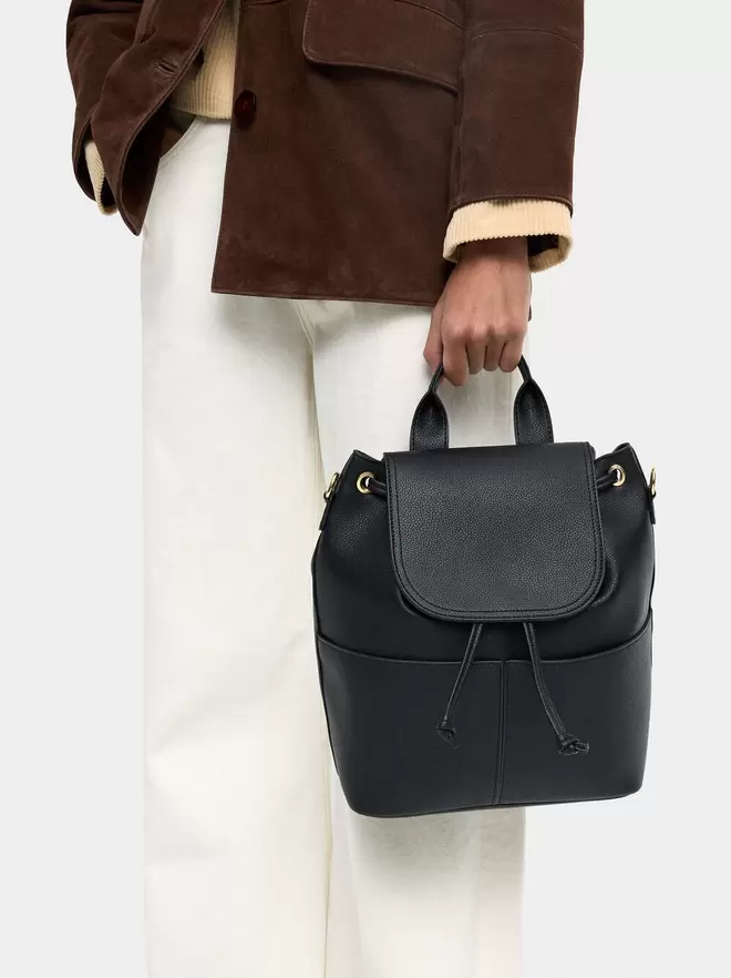 Backpack with texture and flap