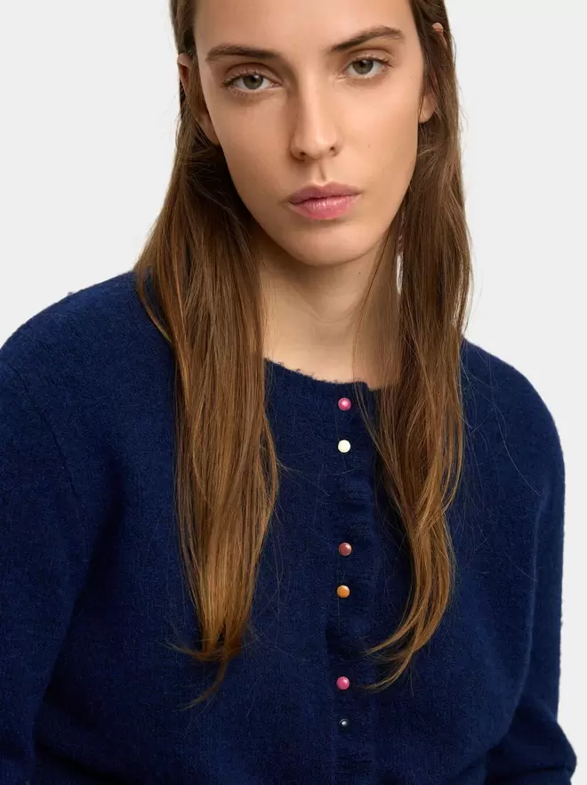 Knitted cardigan with ruffles