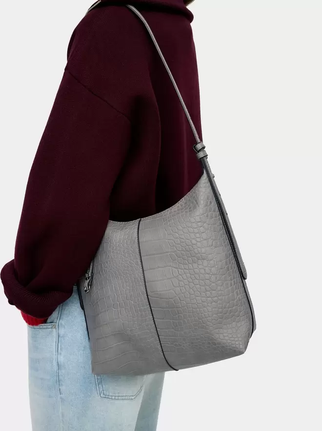 Shoulder bag with animal embossing