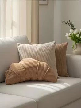 Dekoratív párna kifli alakban