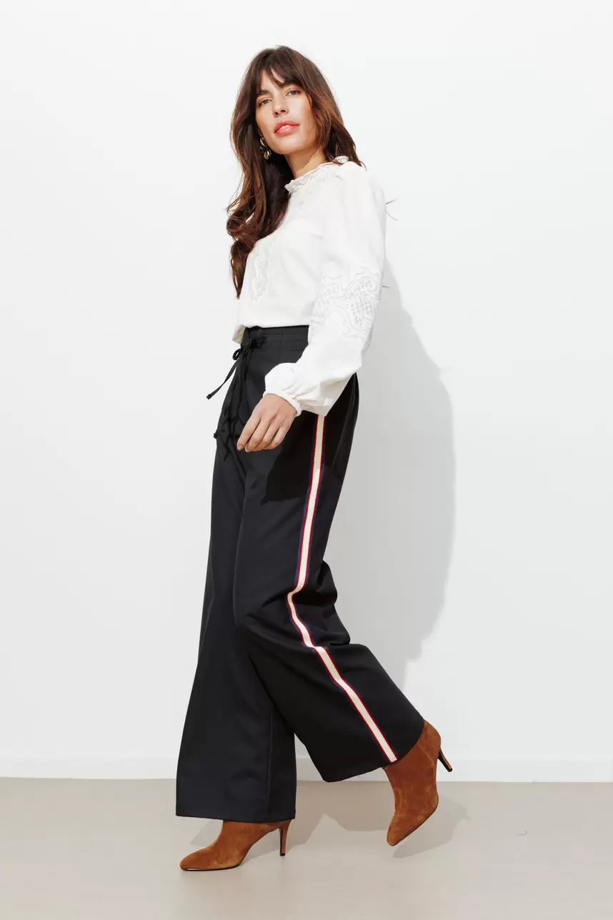 Wide trousers with side bands