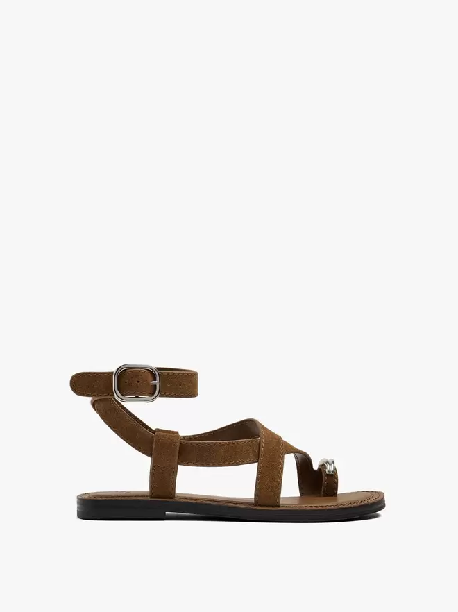 Leather crossed sandals with metallic detail