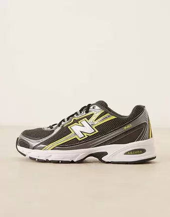New Balance 740 trainers in black and yellow