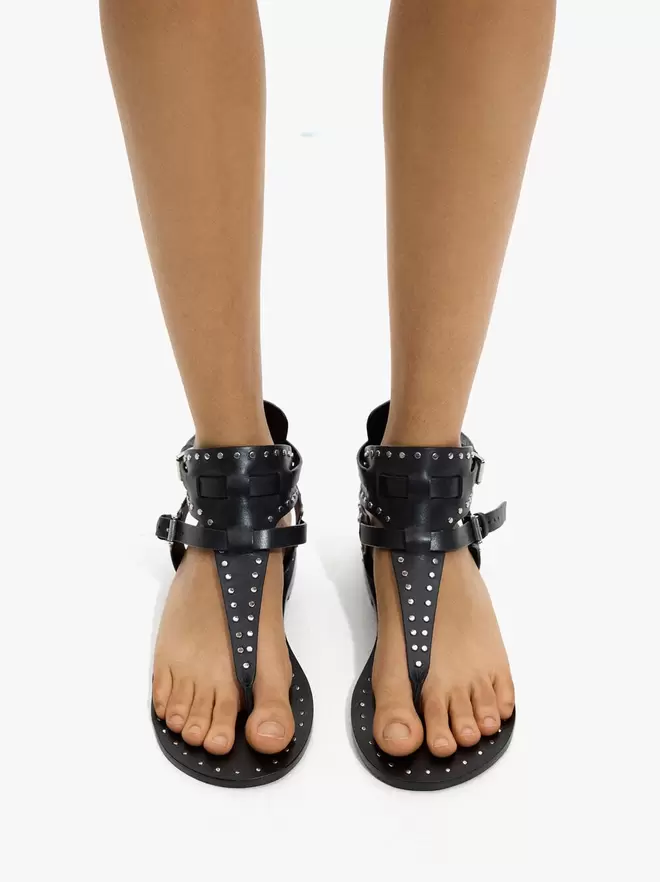 Flat leather sandals with studs