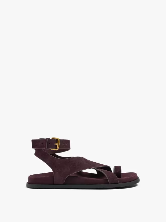 Flat leather sandals with crossed straps