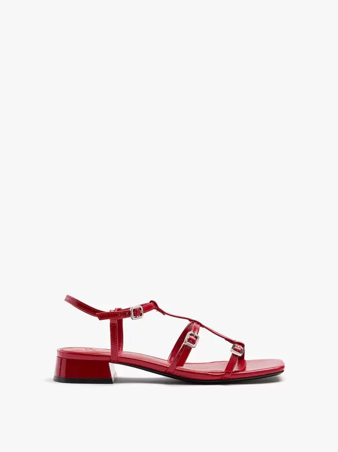 Heeled sandals with straps and buckles
