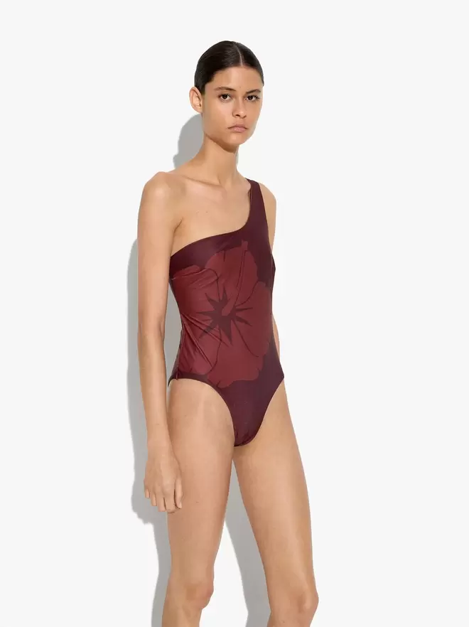 Asymmetric swimsuit printed with floral pattern