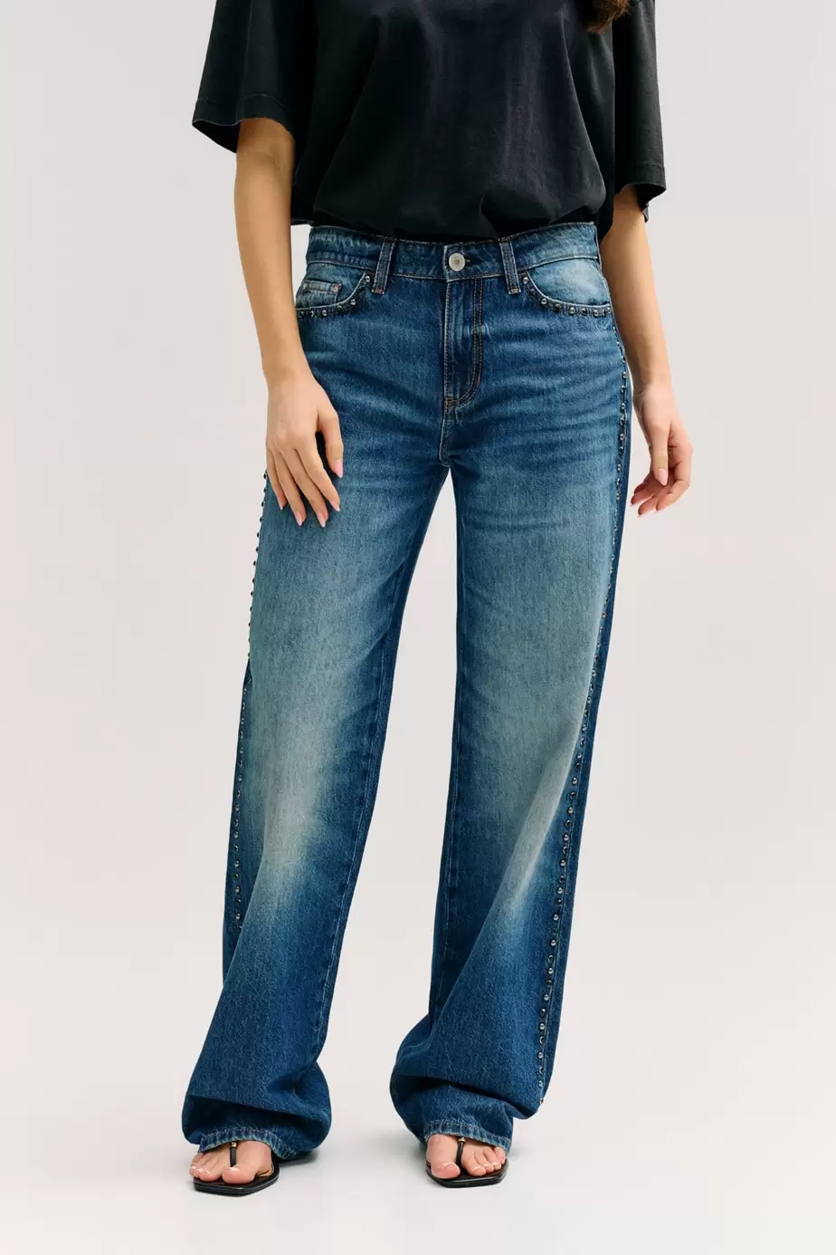 Studded mid rise jeans