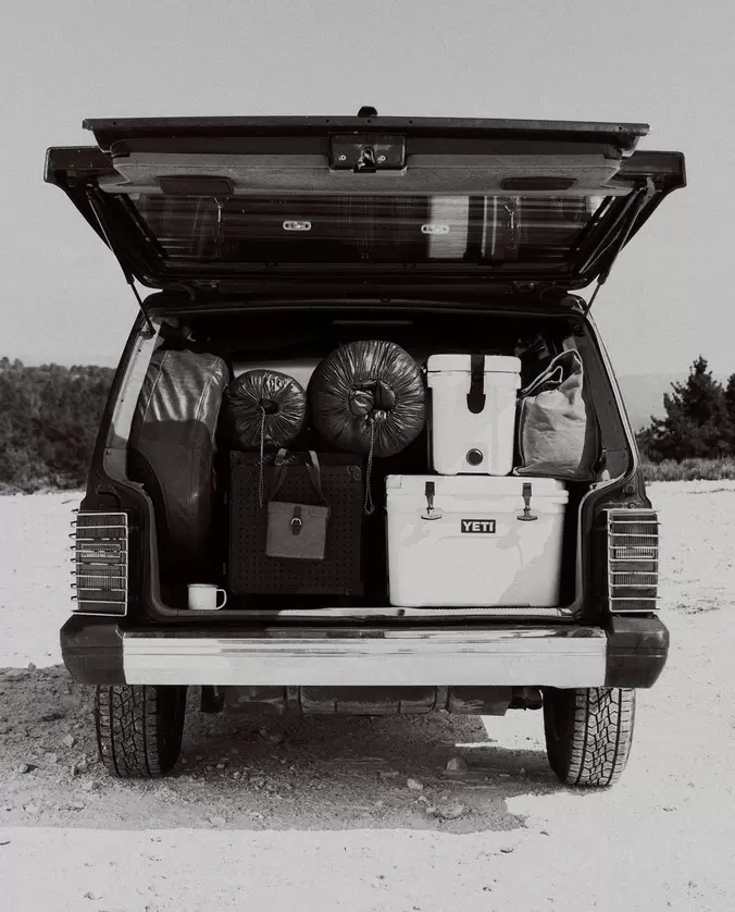 YETI COOLERS, SLEEPING BAGS AND BINOCULARS