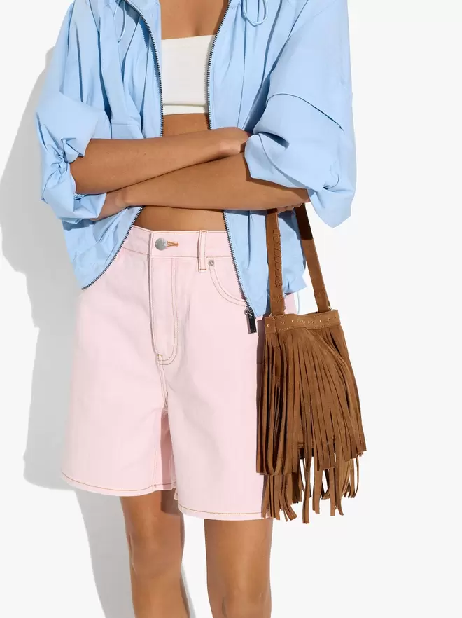 Bucket bag with leather-effect, fringes and studs