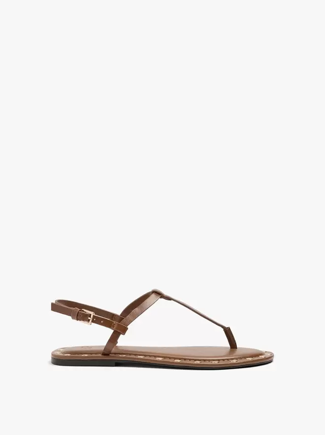 Leather edge flat sandals with studs