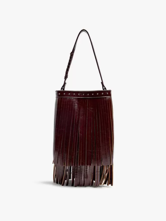 Bucket bag with studs and fringes
